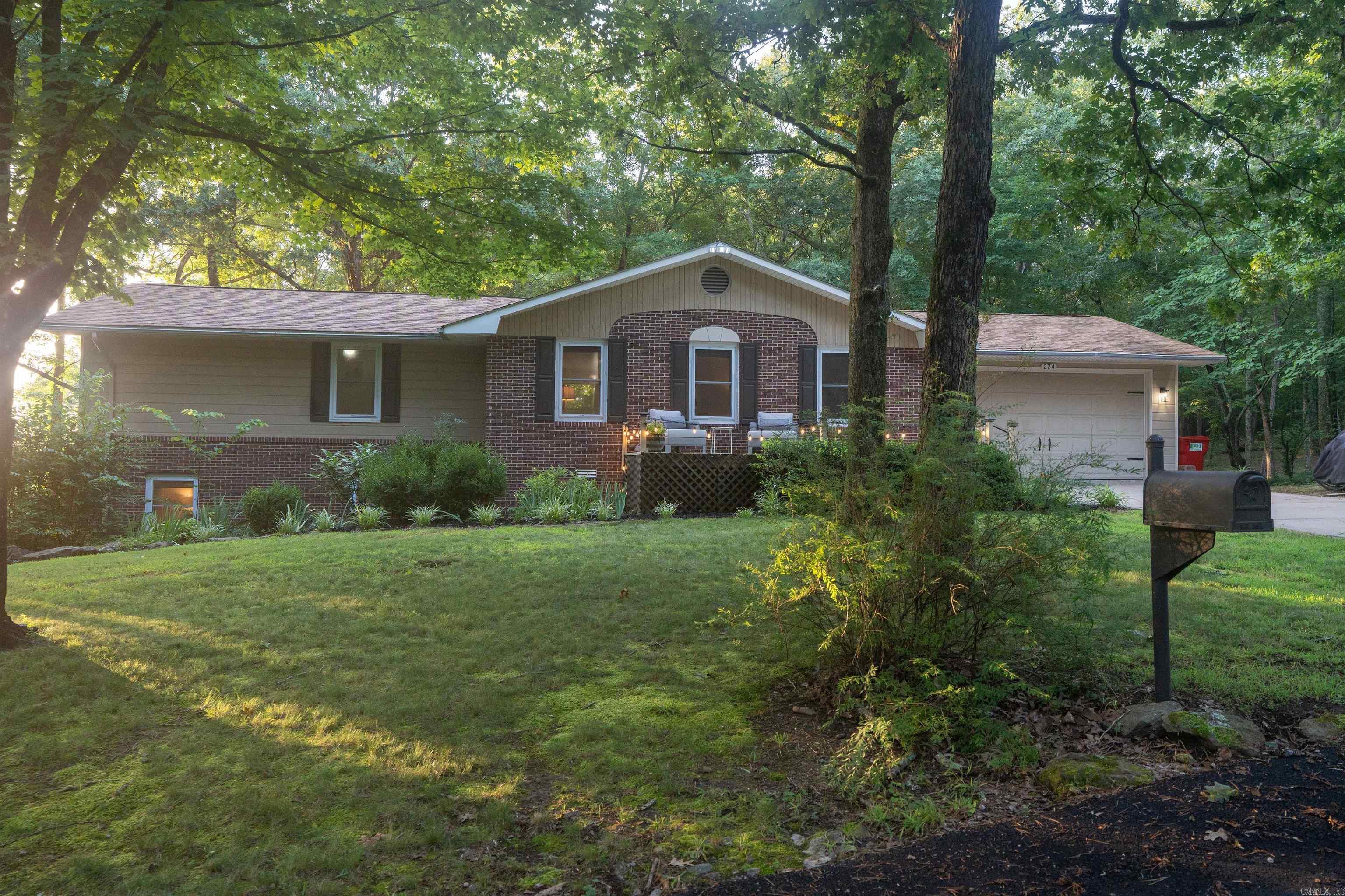 HEBER SPRINGS AREA!!!!!Stunning custom-built brick and frame home located at the entrance to Ozarks, boasting 4 bedrooms, 3 baths, and breathtaking views of Round Mountain and Sugarloaf Mountain. Minutes from Greers Ferry Lake and Little Red River, with easy access to marinas, this home is perfect for outdoor enthusiasts or those wanting to keep to themselves. Enjoy a true chefās kitchen with a skylight, hardwood floors, recessed lighting, and updated bathrooms. Recent upgrades include a newer roof, HVAC, and hot water heater. The versatile office/hobby/storage room and ample storage meet all your needs. Relax on large front and back decks, entertain in the outdoor area with a firepit, or utilize the 2-car garage and extra storage. Nestled in a quiet neighborhood with a private park, this home offers an easy wooded drive, abundant windows, and serenity. Ideal for full-time living or a vacation escape, this move-in-ready gem blends luxury and nature. Call agent today for your scheduled showing.
