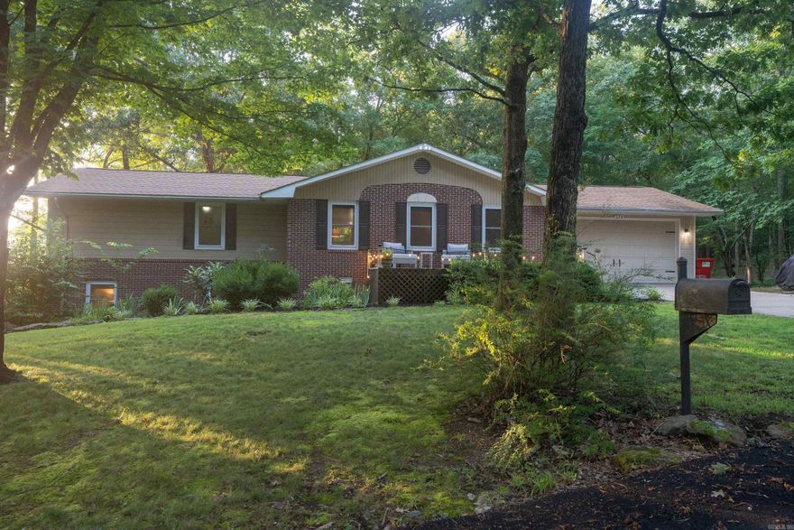 HEBER SPRINGS AREA!!!!!Stunning custom-built brick and frame home located at the entrance to Ozarks, boasting 4 bedrooms, 3 baths, and breathtaking views of Round Mountain and Sugarloaf Mountain. Minutes from Greers Ferry Lake and Little Red River, with easy access to marinas, this home is perfect for outdoor enthusiasts or those wanting to keep to themselves. Enjoy a true chef’s kitchen with a skylight, hardwood floors, recessed lighting, and updated bathrooms. Recent upgrades include a newer roof, HVAC, and hot water heater. The versatile office/hobby/storage room and ample storage meet all your needs. Relax on large front and back decks, entertain in the outdoor area with a firepit, or utilize the 2-car garage and extra storage. Nestled in a quiet neighborhood with a private park, this home offers an easy wooded drive, abundant windows, and serenity. Ideal for full-time living or a vacation escape, this move-in-ready gem blends luxury and nature. Call agent today for your scheduled showing.