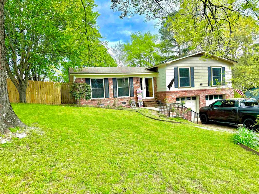 Country Charmer! What a lovely Country Home! A perfect place to raise your family! Lovely neighborhood with lots of room for children to ride their bikes! This seller has put so much work and character into this home it is a one of a kind! You will love all the woodwork and charm! Lovely paint colors and feels like home as soon as you walk in. The foyer is so quaint as you walk in. The living room has nice large front windows and is open to the dinning room area with large wood fireplace and has fantastic wood shelving on each side of the fireplace! Wood laminate flooring great ceiling fan and is so cozy and ready for a family to call their home! The kitchen has newly painted cabin with a touch of wood uppers! Granite countertops and just perfect for the mom that likes to can with all the shelving! The bedrooms are nice size with great colors. The master bedroom has a master shower and large closet! Also the master has a cozy  nook. And slider doors to walk out on your nice deck! The downstairs has a large laundry and pantry area that goes out to the garage and to the mans workshop inside the garage. This home has a huge fully fenced back yard , plenty of room for the kids  to play