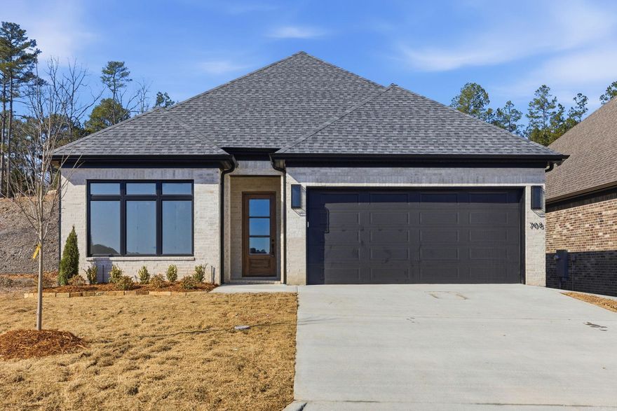 Welcome to 708 Edgewood! This brand-new, move-in-ready home features 4 bedrooms and 2 bathrooms. The community includes weekly lawn care as part of the yearly dues. Inside, you will find 10' ceilings and 8' solid core doors throughout. The living room boasts 12' ceilings, a floor-to-ceiling tiled fireplace, and an abundance of natural light. Floating ceilings offer a modern design that pairs perfectly with the gold finishes and earth tones found throughout the home.The master bathroom includes a large walk-in shower and a free-standing tub. Outside, the property features a private covered porch and a fully fenced backyard. Call the listing agent to see it today!