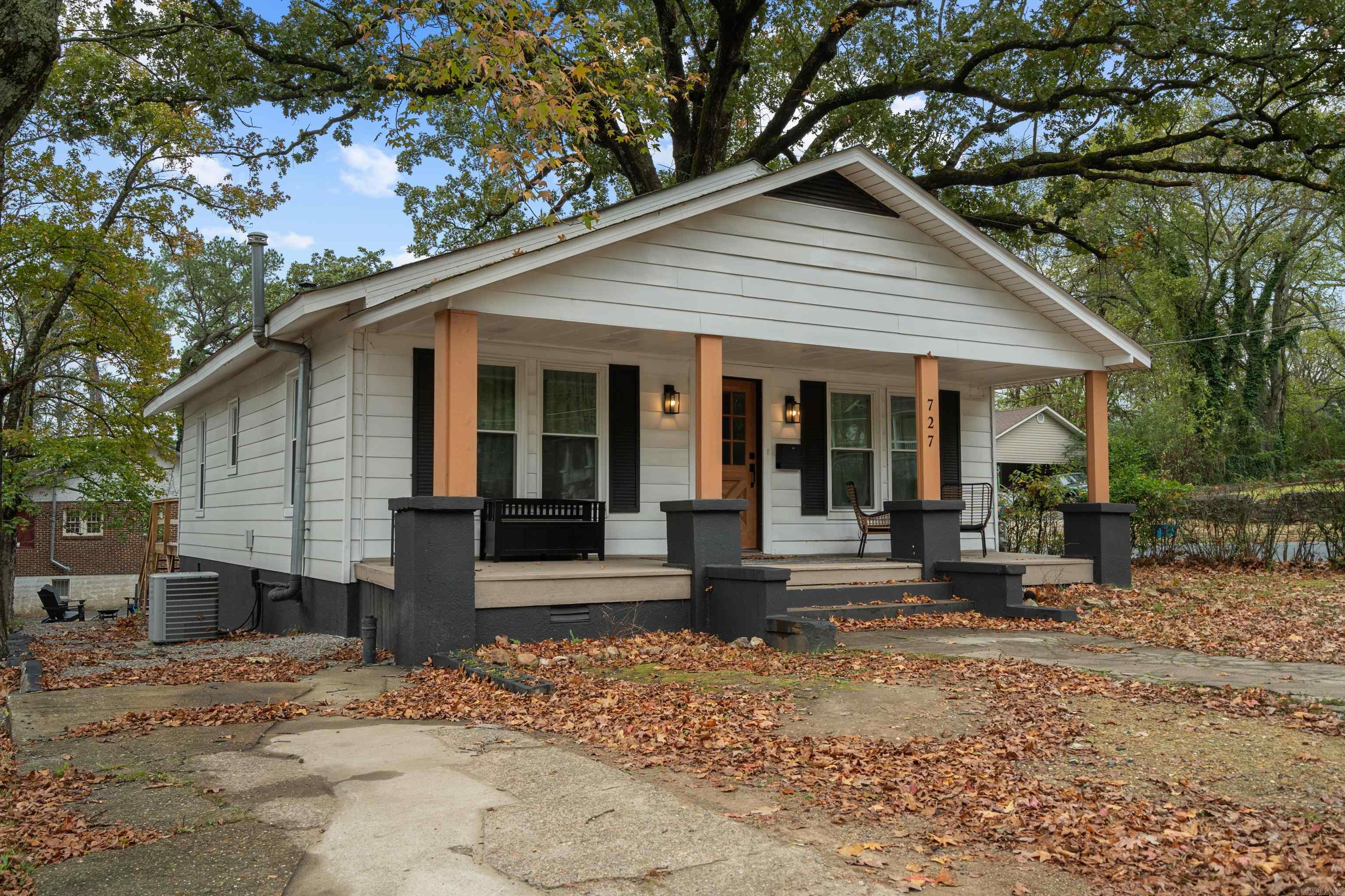 Located in the heart of Hot Springs on a spacious corner lot, this delightful 2 bed/1 bath combines modern comfort w/cozy charm! Abundant light flows through the open & airy floor plan w/so many updates throughout including a state of the art electric fireplace to cozy up to, insulated windows, vinyl plank flooring, kitchen w/granite countertops & stainless steel appliances. New spacious back deck perfect for grilling & entertaining. Seller offering $4,000.00 privacy fence allowance at closing! Would make a great family home or investment property!
