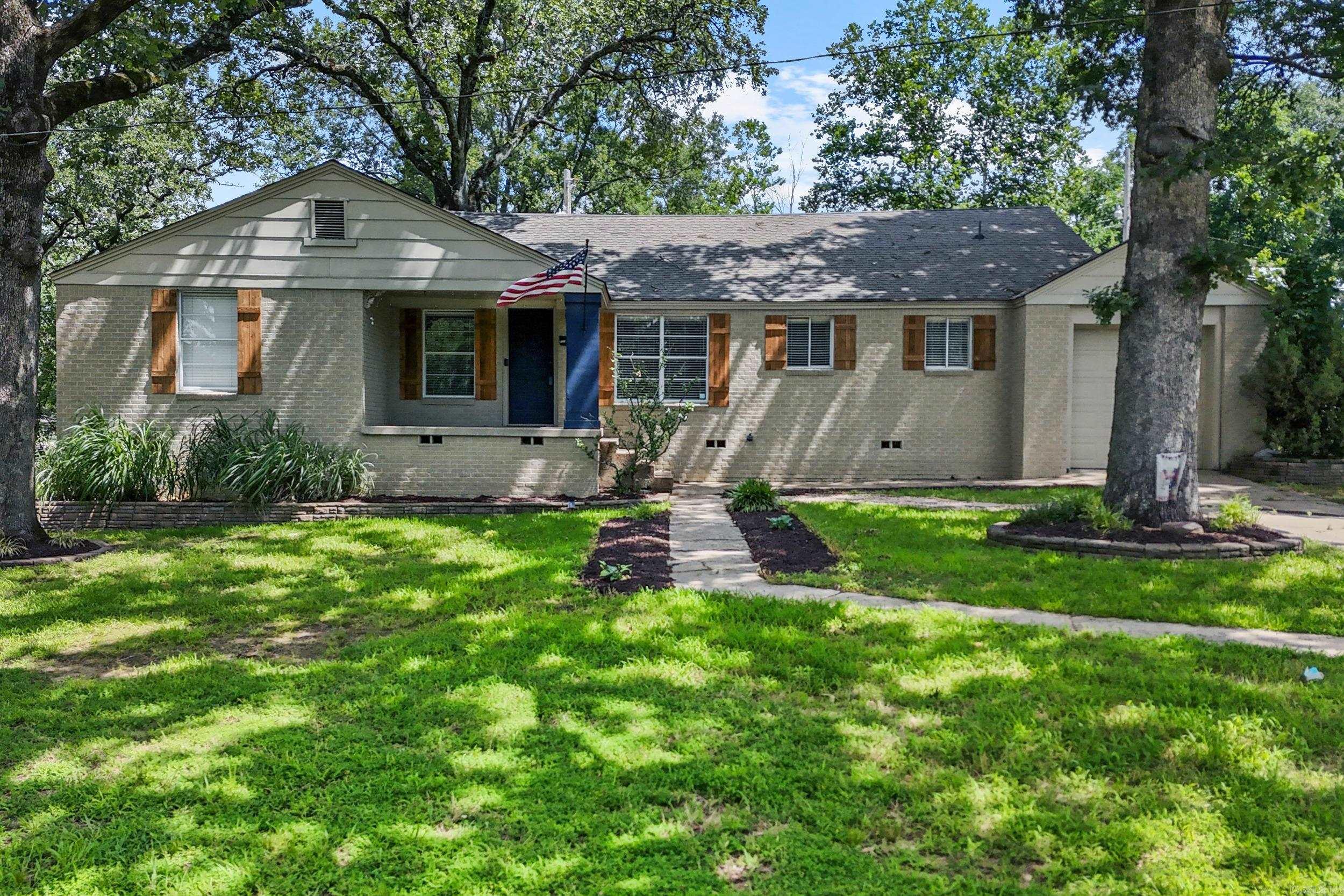 PARK HILL CHARMER on over 1/2 Acre Corner Lot! This OH SO CUTE Historic Park Hill home is Perfect for a Family & Move-In Ready! Featuring 3 Bedrooms, 2 Full Baths, Large Family Room with Wood Beam Detail, and an Office/Flex Room that could be used as a 4th Bedroom. The Kitchen is Spacious with Stainless appliances and Nice Breakfast area! Newer Laminate Flooring, some Fresh Paint, new Shutters, and lots of updates! The backyard has an Awesome Patio for entertaining and the yard is HUGE!! One Car Attached Garage! Highlight Feature is the Low Traffic Road off the beaten path for the kids to run and play! Awesome Park Hill Neighborhood!