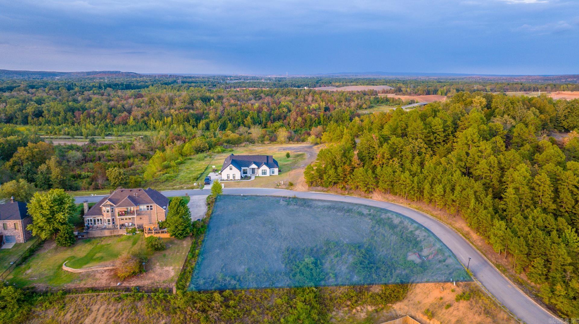 Welcome to the ideal lot to build your DREAM HOME with breathtaking, panoramic views and stunning sunsets! Located in Phase III of the desirable River Plantation subdivision, this lot is conveniently situated between Little Rock and Conway, with easy access to hunting, fishing, and outdoor recreation. Minimum build is 1,750 sq. ft. A custom house plan, perfectly suited to this lot, is available. We've got your house plan..we've got your survey...you just need this lot..Donāt miss this opportunity to create your dream home in an extraordinary setting!