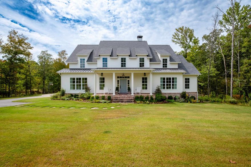 Discover the charm of estate living at it finest, a stunning home nestled on 4+ acres in the exclusive Westcliffe gated subdivision. This custom home by Parkinson Building Group is georgous yet comfortable and boasts exquisite details throughout the house.  Featuring loads of upgrades from heated floors in the Master Bath to a whole house circulation system for the tankless water heater.  Inside, you’ll find custom millwork with no detail overlooked.  The home boasts a security system, cameras and a mesh wifi network to keep divices running smoothly throught the home.  The chef’s kitchen is esquisite, with a seperate 36" refrigierator and freezer, 48" commercial range and additional appliance area in the ample walk in pantry. The 5th bedroom upstairs is oversized and can be used as an office or additional bonus space.  The home also offers a tornado shelter and oversized 4 car garage with plenty of storage.  The outdoor space is equally impressive, featuring built in grilling station with quatzite countertops and a vaulted patio perfect for entertaining. The back yard has been fenced in with trails throughout the additional 2+ acres of woods for walking or riding.