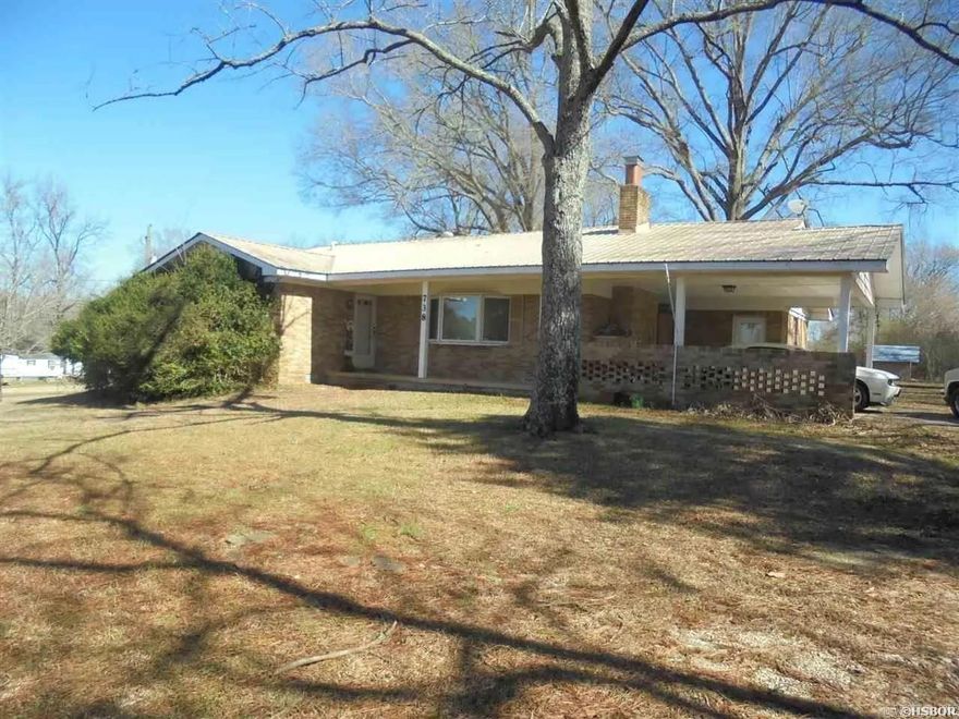 Great deal on this Brick home ,with metal roof sitting on 2.5 acres.Home has 1,515 square ft. with 2 bedrooms,1 full bath,large living room with gas log fireplace ,plus, heating and air.Split kitchen /dining with tons of cabinets, breakfast bar,a laundry room /utility room out to carport.There is a good size sunroom off the dining area to sit out and have a place to unwind and enjoy nature. This would make a great starter home or retirement home. By appointment only.