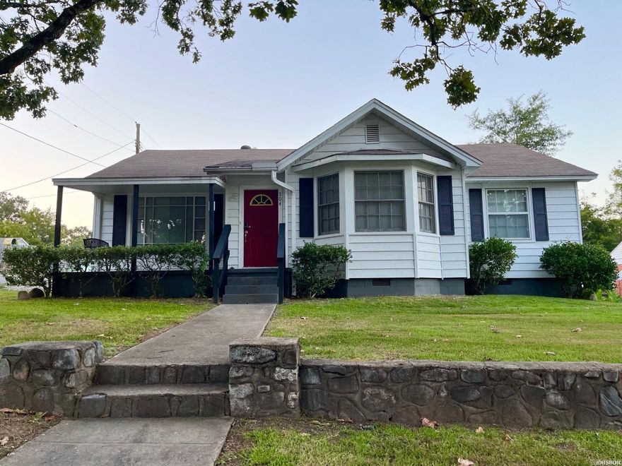 Adorable!! Take a look at this remodeled mid-century modern home. Less than one minute from Oaklawn Racetrack! Which makes for an easy walk during race season. There is so much character reflected in this well maintained home. Perfect for vacation rental opportunities or a full time residence. There are 3BR/2BA in this one level home. Hardwood Floors, tile flooring in bonus room, kitchen and bathrooms. Cedar lined closets in the bedrooms. Bonus room could be used as fourth bedroom, game room, office or just another space to enjoy family. Quiet, established neighborhood. Currently licensed for a short term rental. Appointment required. Don't wait. This one will go quickly.