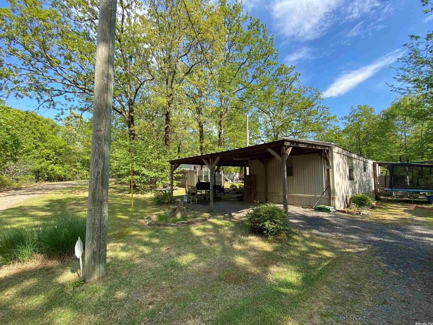 Great property in Romance! 2 bed/2 bath 16x70 manufactured home on 1 acre!! Short drive to Rosebud, Beebe, or Cabot. Inside you will find a split floorplan offering spacious rooms and a nice open feel to living room and kitchen area. Single car carport has been added outside along with a front and back porch. As you arrive you will notice beautiful landscaping and extra space out back to enjoy a nice fire in the evenings. 12x16 shop out back featuring electric + A/C and an additional 8x8 storage shed.