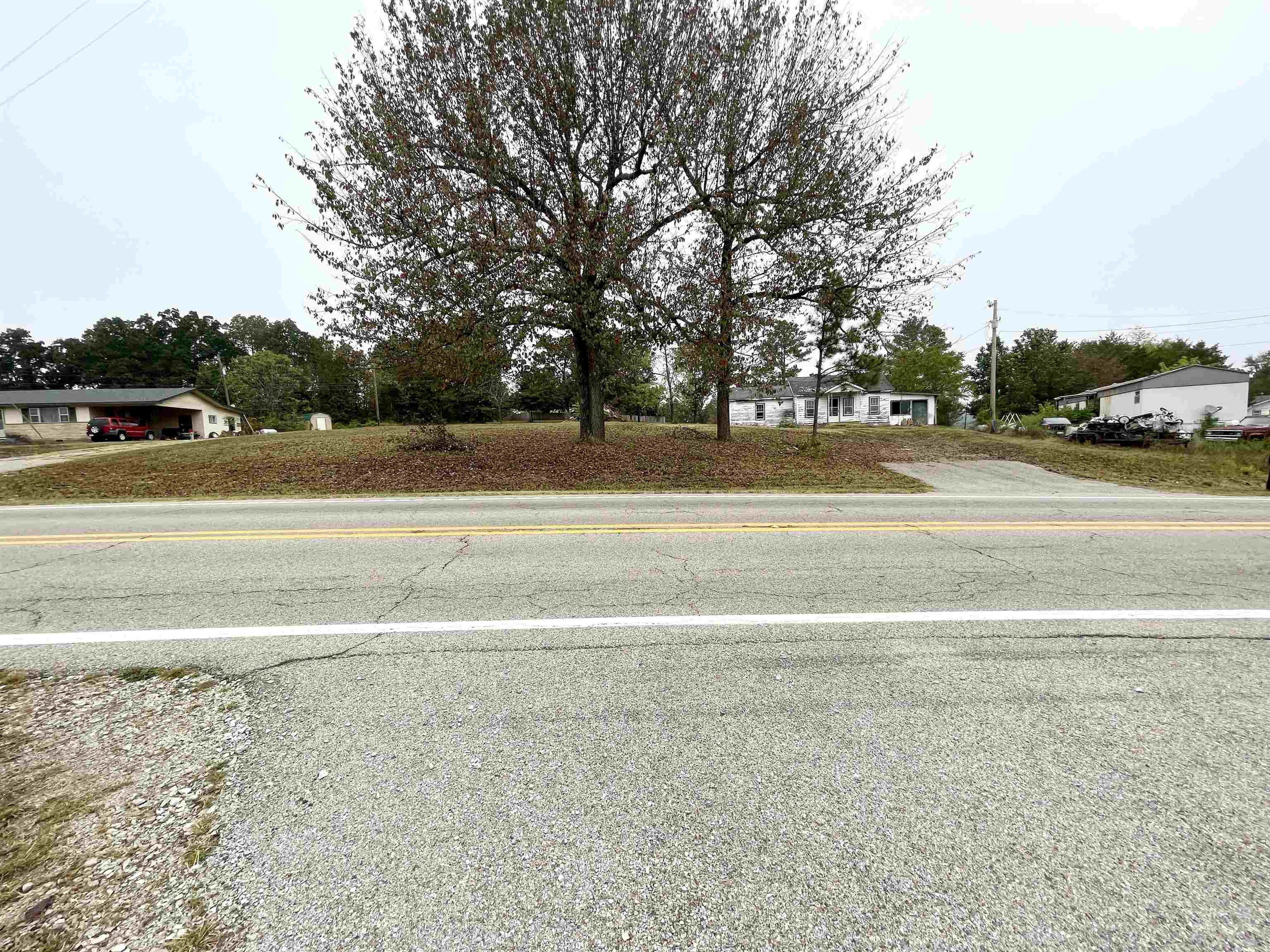 `RARE FIND! 1.52 Ac Priced to sell inside Salem Ar. City limits on Hwy 9 South. City water and sewer. Perfect for commercial or build your new HOME! Cleared with great highway access onto the property. Beautiful views for building or for investment purposes. This is a very rare opportunity for property within the city limits. Close to all amenities of Salem, so don't miss this chance for ownership! 1.52 Acres M/L located in the Ozarks in Northern Arkansas, 25 minutes to Lake Norfork and within 30-45 minutes of Mountain Home AR - West Plains, MO, and Batesville AR.