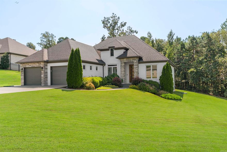 Modern, elegance and charm all in one beautiful package. This stunning home in the gated community of Lochridge Estates has so many wonderful upgrades. The ultra functional kitchen includes ceiling height cabinets, stunning granite tops, upper end appliances and a built-in coffee bar area. Other upgrades include brand new carpet in guest rooms, hardwoods in all the common areas, the executive office and the primary suite. The luxurious master suite features a lavish bath space and generous size closet. Outdoor you will find an expansive deck area that is truly a lush oasis with unbelievable landscaping. Too much to list. This is a must see in person.