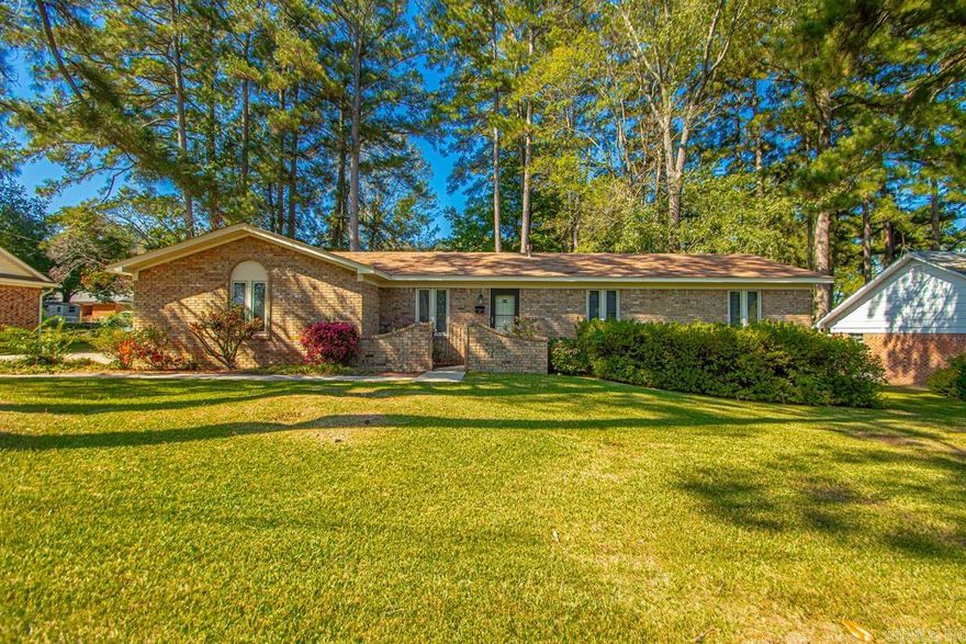 This charming home features a formal living area as you enter from front door but also offers a den that gives gives ample living space for families or an individual. It is nestled on a large lot with of outdoor space for gardening, entertaining or just relaxing & enjoying nature! What an opportunity to personalize the space!! With its classic design and generous lot size, this home is a blank canvas awaiting your vision. The kitchen area is super with an island!  Three bedrooms & two full baths complete this wonderful home. The covered patio & extra storage room outback is certainly an extra!! Great location & school district! Come take a look!!