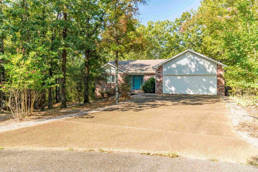Welcome to 11 Campeon Court, a charming and serene residence nestled in the peaceful community of Hot Springs Village, Arkansas.This home would be a great purchase for someone that doesn't mind giving the home a makeover which it deserves. Features include:Split floor plan, 3 bedrooms up and 1 bedroom down plus bathroom, Arkansas room, and deck. Located on a quiet cul-de-sac, the property boasts a lush yard ideal for outdoor activities and relaxation. Whether you're seeking a cozy retreat or a family-friendly neighborhood, 11 Campeon Court provides an inviting atmosphere with convenient access to local amenities, recreational facilities, andthe natural beauty of the surrounding Ouachita Mountains. Don't miss the opportunity to make this lovely house your new home!