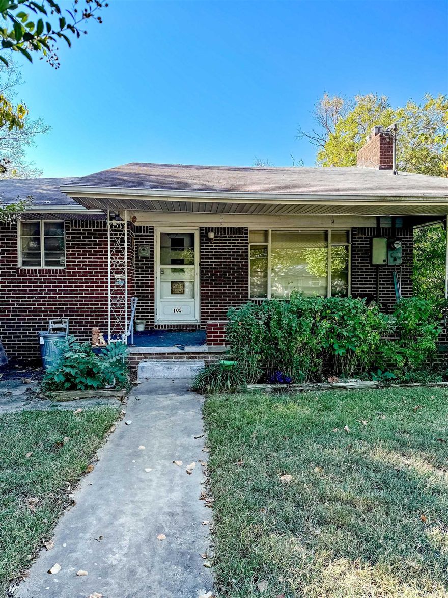 Great all brick Family home in older neighborhood, offers a fantastic opportunity for those looking to add their personal touch! This home just needs some cosmetic TLC to truly shine. Features 2 living rooms and lots of room to make an office or extra bedroom. (See floor plan layout) One car garage offers protection from weather.  Seller plans to replace HVAC. Extra lot included which extends to railroad, with 30 x 48 concrete slab for potential workshop or garage.
