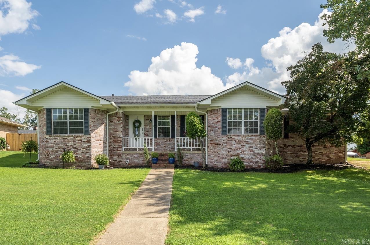 Welcome to 200 Cole Place! This beautifully updated home blends timeless charm with cozy comfort, creating the perfect retreat for everyday living. Greet your guests from the inviting front porch, then step inside to a warm entryway that opens to an ideal floor plan. Featuring 3 bedrooms, 2 bathrooms, and an inviting den with wood burning fireplace, this 1,968-square-foot home offers plenty of room to relax and unwind. The generous primary suite serves as a peaceful oasis, perfect for recharging at the end of the day. Enjoy outdoor living in the fenced backyard with a brand-new privacy fenceāideal for evenings on the patio with friends and family. Located on a corner lot in a quiet subdivision within the desirable Lakeside School District, this home is just minutes from all that Hot Springs has to offer, with easy access to the bypass for convenient travel.