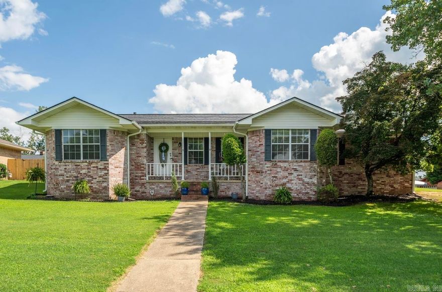 Welcome to 200 Cole Place! This beautifully updated home blends timeless charm with cozy comfort, creating the perfect retreat for everyday living. Greet your guests from the inviting front porch, then step inside to a warm entryway that opens to an ideal floor plan.  Featuring 3 bedrooms, 2 bathrooms, and an inviting den with wood burning fireplace, this 1,968-square-foot home offers plenty of room to relax and unwind. The generous primary suite serves as a peaceful oasis, perfect for recharging at the end of the day.  Enjoy outdoor living in the fenced backyard with a brand-new privacy fence—ideal for evenings on the patio with friends and family. Located on a corner lot in a quiet subdivision within the desirable Lakeside School District, this home is just minutes from all that Hot Springs has to offer, with easy access to the bypass for convenient travel.