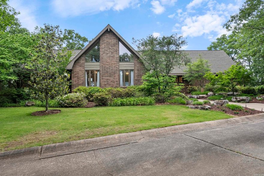 ENTERTAINERS DREAM HOME! Welcome to this beautiful home with stunning views overlooking Conway on approx. 2.51 private, wooded acres. As you make your way up the drive, you will be amazed by this three-level home that features 5 bds, 4.5 ba, open kitchen, formal dining, 3 living spaces, Office & flex rooms, 2 garages, outdoor kitchen & dining, AMAZING views from the multi level deck w/sunken hottub, water feature, extra landscaping, & sprinkler systm. Pella roll-screen windows,solid wood doors,custom birch paneling, antique brick floor downstairs. RECENT UPDATES include: Downstairs NEW PAINT, FLOORING, & LIGHTING & downstairs bathroom remodeled. A focal pt in the main grt rm is a rock & flagstone fireplace extending to the top of the 2story vaulted ceiling. Upstairs you will find the theatre rm w/extensive hidden storage and exercise area, living space, and office. Downstairs has 2 bedrooms w/ 2 full baths, living area w/ antique brick floor, game area for your gaming tables & bar area. Could also be used as a mother in law quarters, H/C Workroom off the ds garage. H/C 27x20 mancave w/storage.  AGENT SEE REMARKS! This home is a MUST SEE!