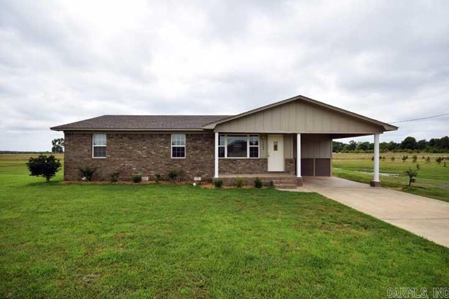 Adorable home on acreage.  Home has 2 storage buildings one 10x15 storage building and one 8x12 Dierksen building.  New roof 2013.  Open floor plan great for entertaining.  Original hardwood floors and new laminate.  Eat in kitchen has breakfast bar with new stainless steal appliances and a stainless steal refrigerator.  New counters and backsplash in 2013.  Tankless hot water heater.  Fresh coat of paint and new vanity.  Alarm system. Call me to check out this amazing home.