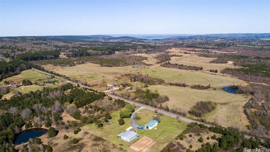 CATTLE farm on LARGE ACREAGE with existing rental income! Great spot to bring your cattle or livestock.  280 acres of pure heaven.  Also includes a ranch style brick home with a long term tenant.  Fully fenced.