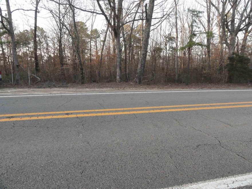 2.25 acres M/L of unrestricted land in North Central Arkansas. This would make a great residential lot just barely outside of the Clinton, AR city limits. Close to town but in the country. Level to gently sloping with paved highway frontage. Rural water lines, fiber and copper telephone lines at the highway and electric lines and fiber internet at the back edge of the property. Greers Ferry Lake is about 20 minutes away and Buffalo National River is only about 50 minutes away. This is a great central location for numerous outdoor activities such as fishing, swimming, skiing, hiking, horseback riding, hunting, exploring and much more. Branson, MO which is a wonderful vacation spot is only 2 hours away. Walmart in Clinton is 10 minutes away. If you are looking to live in North Central Arkansas, this area would make a great location to live a “Laid-Back” life. The pace of life in this area is so much slower than the ”Hustle & Bustle” of big city life. Come and try it. Survey is available.