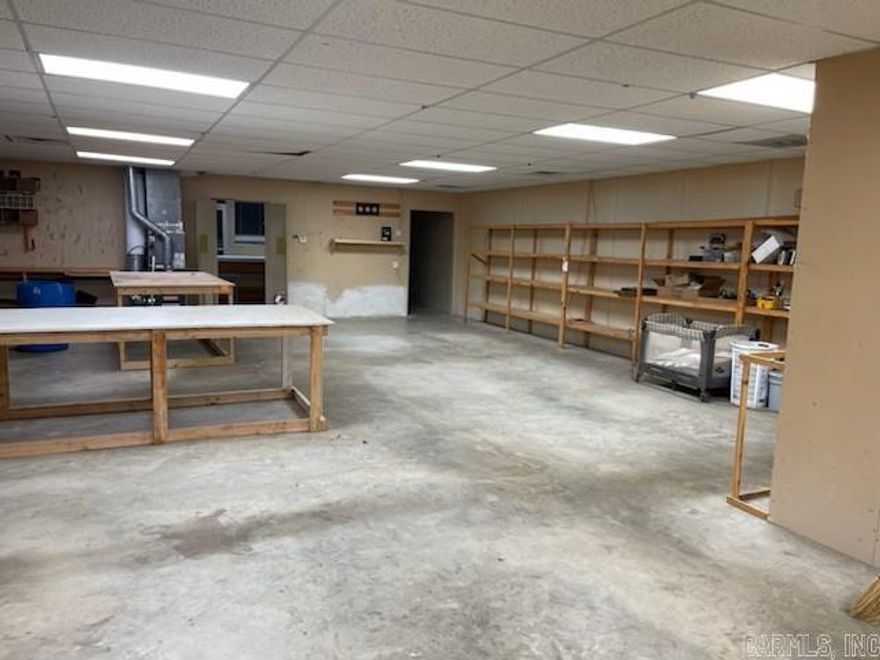 Currently being rented by Hickman Underground, The old Superior Trophies building. 30 x 60 building located on just over 1/2 acre. Great location just off the Congo overpass on the I 30 Service Road.