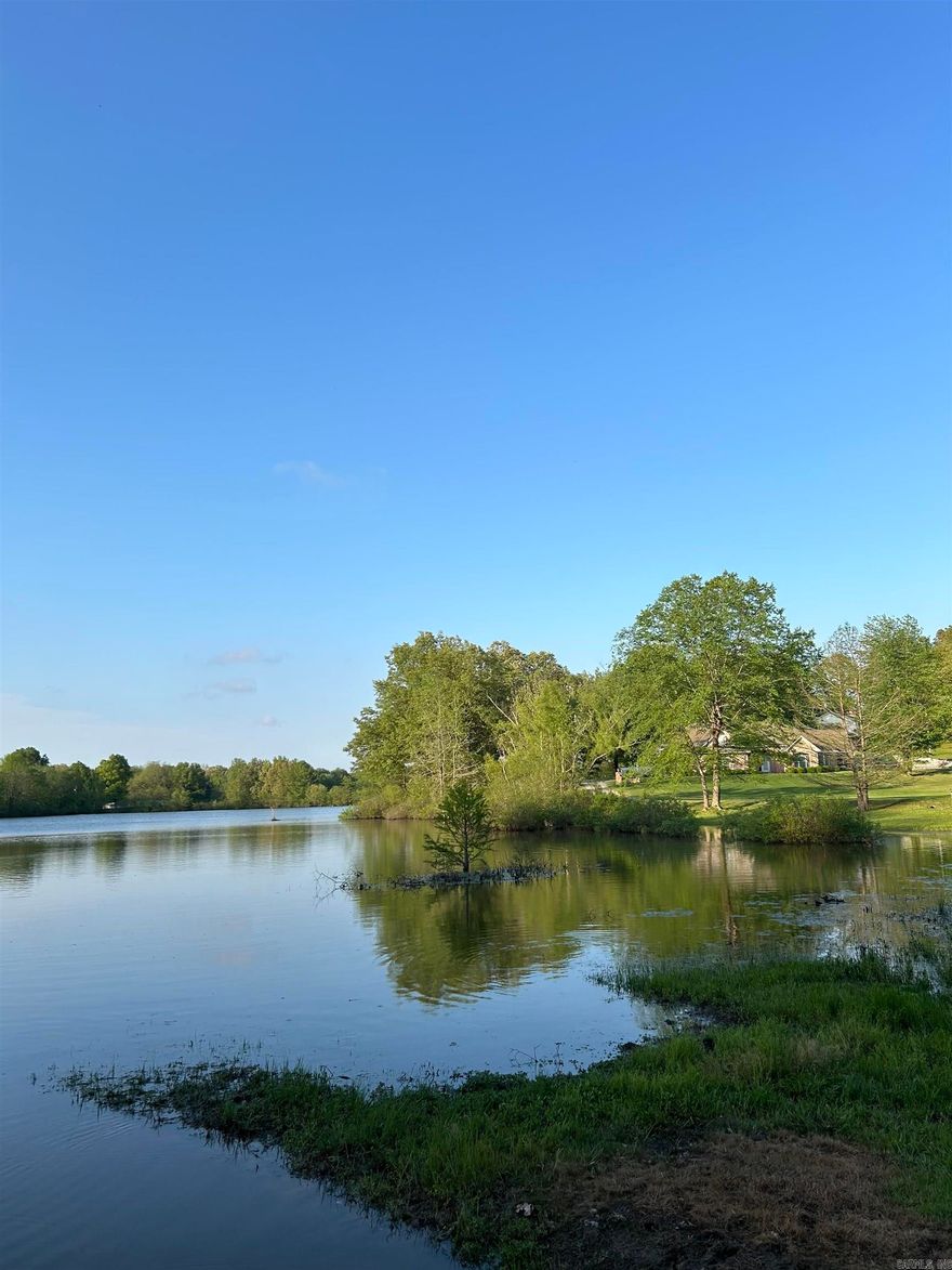 This exceptional tract offers approximately 18 acres, with 9.96 acres dedicated as your own private lake, creating a setting that is both peaceful and breathtaking.  The remaining acreage is raw, build ready ground, perfectly suited for your dream home, weekend retreat, or legacy property.  Imagine waking up to panoramic water views, fishing just steps from your back porch door, or enjoy quiet evenings surrounded by nature- all while being just minutes from town.  Private. Scenic. Unmatched.