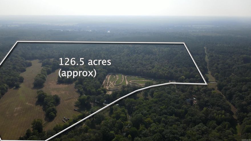 Beautiful Property with Prairie Bayou running through the center. Located about 20 minutes from Benton and 15 from Arkadelphia. Has an amazing motor-cross track on site with numerous trails cut throughout for hiking, biking or any other type of motorized toys, fabulous pasture land, is in a flood plain due to the proximity to the Creek but has high areas to sit a Grand Dream Home. Or could be utilized for hunting, fishing, camping. You dream it this could be the spot. Come see for yourself.