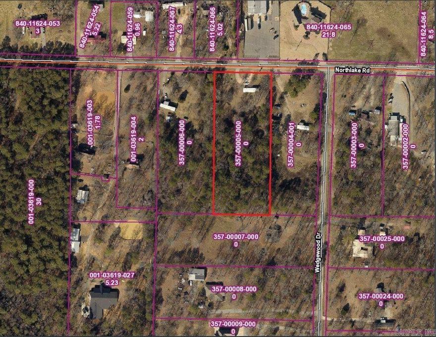 Three acres of great land to build on!  Close to Springhill Elementary and Bethel Middle School.  Property has a mobile home on it that will convey at no value.  Build what you want being in the county but close to everything!