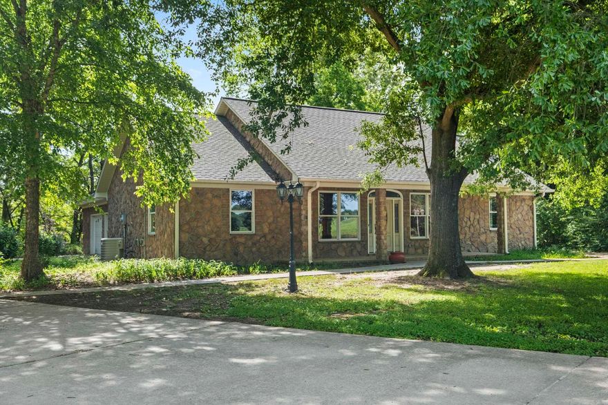 Sitting on the banks of the Cache River is this all-rock exterior home. This custom built, open concept home and extra-large kitchen is built for entertaining or just enjoying the river life. The Cache River in Arkansas is known for its vital role in preserving bottomland hardwood forest habitats and providing critical wintering grounds for migratory waterfowl, especially mallard ducks. This home features a large sunroom overlooking the Cache River. This home is a must see to appreciate.