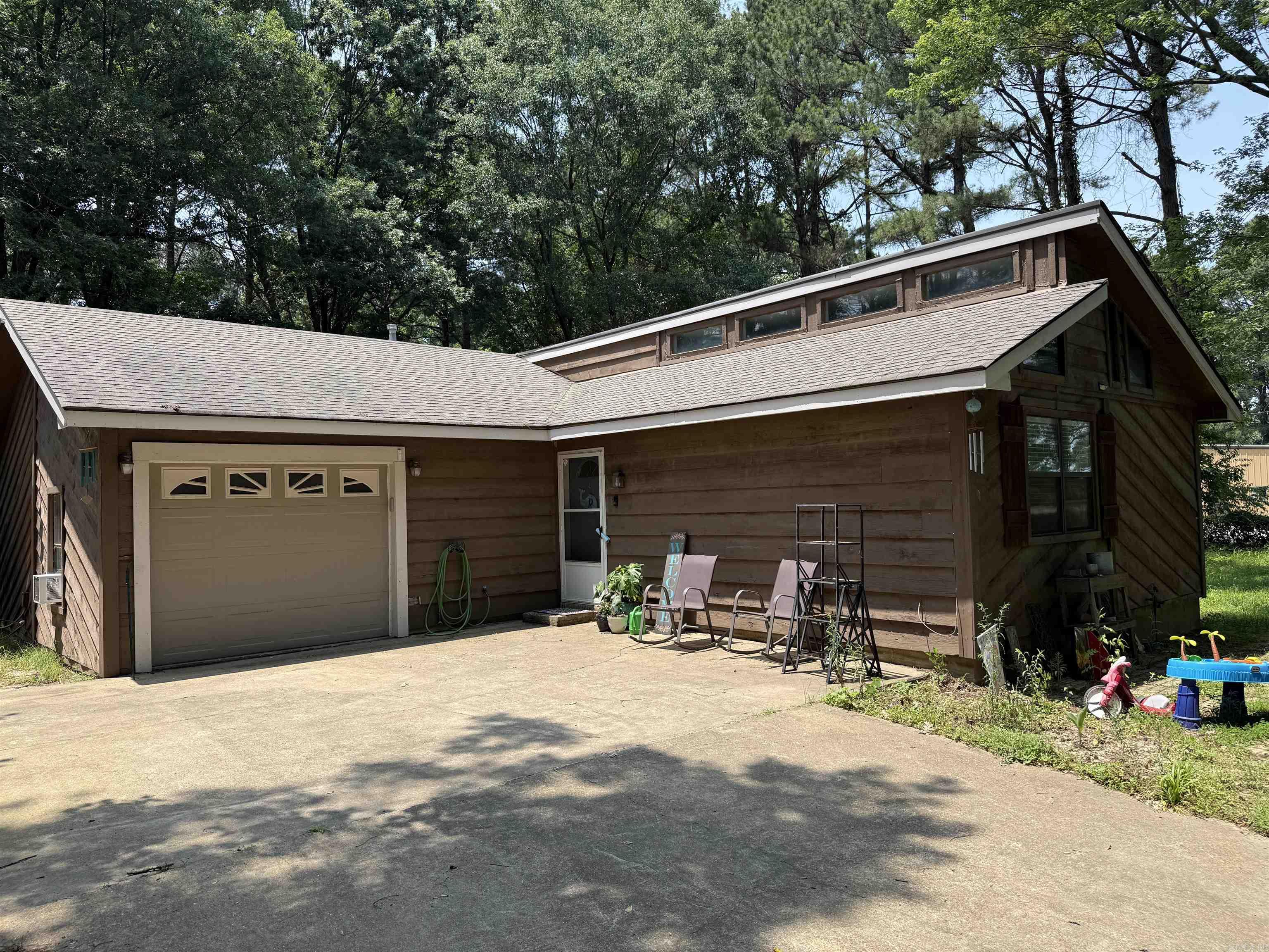 Charming Country Retreat ā Just Minutes from Town! Escape to this move-in-ready, well-loved home nestled on 2+ acres of serene countryside. This 2-bedroom, 2-bathroom gem has been thoughtfully updated with modern touches over the past two years, making it the perfect blend of comfort and style. Featuring brand new LVT flooring, updated appliances, sleek countertops, freshly painted cabinets, and updated bathroom vanities, this home is truly turnkey! The spacious living room is bathed in natural light by day and offers a stunning view of the moonlit sky at night, thanks to large windows that bring the outdoors in. Gorgeous wood beams add character and warmth, creating a cozy, inviting atmosphere that you'll love to come home to. You'll also appreciate the convenience of a well-sized shop, perfect for hobbies or extra storage. With its peaceful setting and proximity to town, this property offers the best of both worlds. Donāt miss your chance to make this your new home. RD-USDA, FHA, VA, Qualifying Home. Call today for a showing before itās gone!