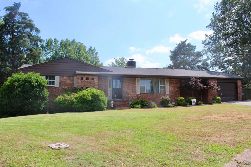 Looking for a place to call home in one of Searcy's most established neighborhoods? This charming residence is nestled in a community that prides itself on annual get-togethers and lively parties, fostering a sense of fellowship and camaraderie among its residents. Step inside this delightful home and be greeted by its preserved original character, which only enhances its charm. The spacious interior includes natural built-ins. Imagine relaxing on the large deck, which offers a view of the expansive backyard—a perfect spot for entertaining guests or enjoying a peaceful evening. Additionally, the sunroom, a lovely addition to the home, invites you to bask in natural light year-round, making it a cozy retreat for reading or sipping your morning coffee. To top it all off, the home boasts a relatively new roof, just two years old, ensuring peace of mind for years to come. This property offers a blend of character, space, and community spirit, all at a great price. Don't miss out on the opportunity to make this charming house your new home. Let's go take a look and envision your future here!