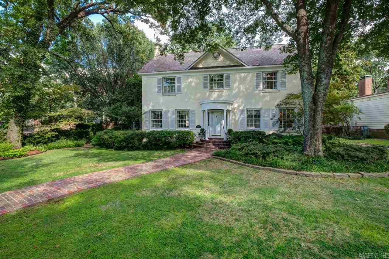 Elegant Heights home with extraordinary entertaining space & resplendent outdoor living. Impressive great room has an 18-foot vaulted/beamed ceiling & wet bar. Elegant master bath addition with spacious closet/dressing room. Updated French country kitchen. Third-floor bonus room. The private yard is like a secret garden with mature perennials, pebble pathways, carved-stone fountain & stone fireplace. 12'X26' work shop with heat/air/electricity. Fresh, neutral interior paint. See remarks for exclusions!