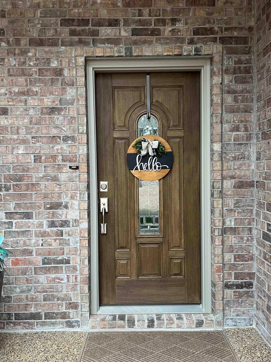 This immaculate single-story home is situated in Hot Springs Village boasts a prime location and a seamless one-level living layout with an open floor plan. The abundance of welcoming windows floods the living space with natural light, offering breathtaking views of the Isabella Golf Course – a stunning way to start each day.  The main living area exudes warmth and coziness, complemented by a modern fireplace ideal for relaxing evenings. The well-appointed kitchen features newer appliances, a large walk-in pantry, and ample counter space, perfect for cooking enthusiasts and entertainers alike. The breakfast nook overlooking the Tee Box adds a charming touch to daily routines.  The large primary bedroom includes an oversized walk-in closet, creating a luxurious retreat within the home. Outside, the low-maintenance landscaping and level lot provide a serene backdrop, with a spacious covered deck for grilling and entertaining.  Conveniently located near the East Gate from DeSoto Blvd, this home offers easy access to Granada, Isabella, and Diamante Golf Courses and Grills – a golfer's paradise. Additional features like an oversized 3-car garage, a new Rheem 80-gallon water heater.