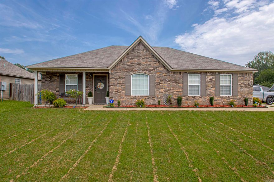 Welcome home to this beautiful 4 bedroom 2 bath family friendly home close to the amazing Harmony Grove schools! Nestled on a large corner lot with a side load 2 car garage, this home lives large with it's semi open concept plan.  The kitchen is huge and has a lovely dining space connected.  The living room is oversized and perfect for a family of any size.  There are 3 bedrooms down a hall and the master is separated by another hall.  The master bath is large with a separate tub and shower and double vanity! Luxury vinyl in main areas, tile in wet areas and newer carpet in bedrooms.  Hurry and schedule your showing today! Don't miss your opportunity to make this amazing house your new home! **AGENTS SEE REMARKS**