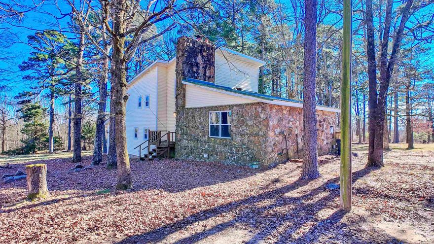 Need SPACE? Here it is—inside AND out! This incredible property offers SIX bedrooms, 2.5 baths, a large bonus room, plus a small basement for extra storage—room for everyone and everything. Step outside to find a full HOMESTEAD READY package: a barn with stables, a 36x36 shop, and 8 beautiful acres to spread out and enjoy. Love the outdoors? You'll appreciate the location just as much as the home—approximately 3 miles from rock climbing at Jamestown Crag and about 1 mile from Arkansas Game and Fish Commission land, offering prime opportunities for hunting and hiking. Space, land, and location—this one truly has it all!