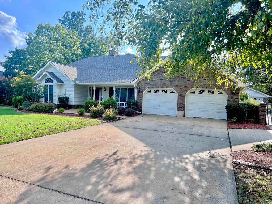 WOW! Custom built from top to bottom! This extremely well maintained 4BR/2.5BA home is sitting on almost an acre of land, and has plenty of space for you! Features of this beauty include: hardwood flooring, formal dining room off spacious kitchen with breakfast area, inviting living room with a beautiful fireplace, all large bedrooms with an oversized master suite, double vanities in both guest and master bathrooms, luxurious master tub with air jets for relaxation, an area off the master perfect for office or home gym, and a second living room at the back of the home overlooking the beautiful inground pool. New roof installed, and a large shop in the backyard with electricity. Fully fenced with a 2 car garage. This home has it all! Call today for your appointment!