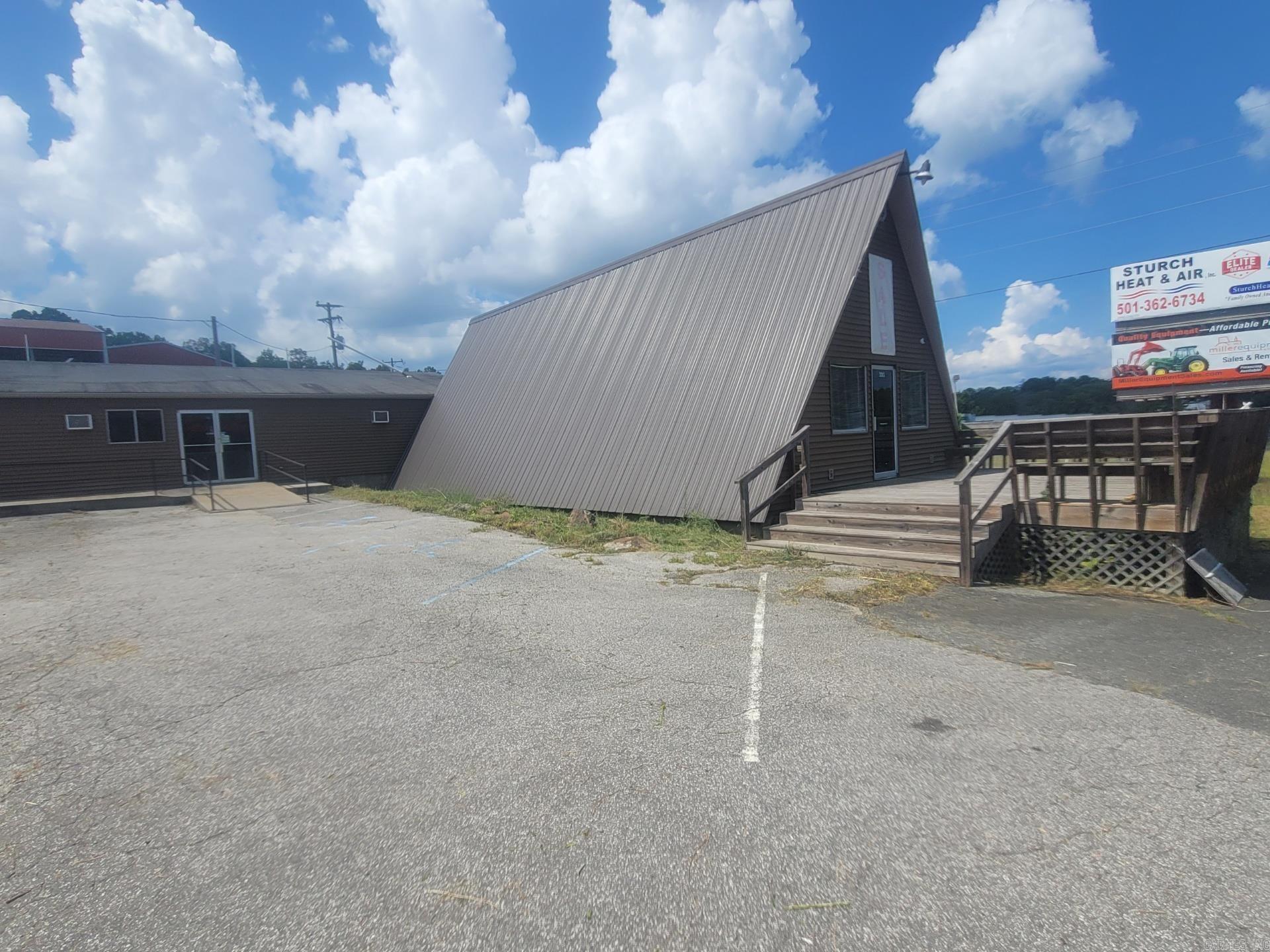 Prime Commercial Opportunity near Greers Ferry Lake! Located on the high-traffic Hwy 25B N in Heber Springs, this 3,650 sq ft A-frame commercial building offers excellent visibility and endless potential. Formerly operated as a seafood market and restaurant, the property is ideally positioned just minutes from Dam Site Recreational Park and beautiful Greers Ferry Lake—perfect for capturing lake traffic and visitors. Featuring ample parking and flexible interior space, this location is ideal for a restaurant, retail store, coffee shop, or specialty business. With its unique architecture and sought-after location, this is a fantastic investment opportunity in one of Heber Springs' most active areas.
