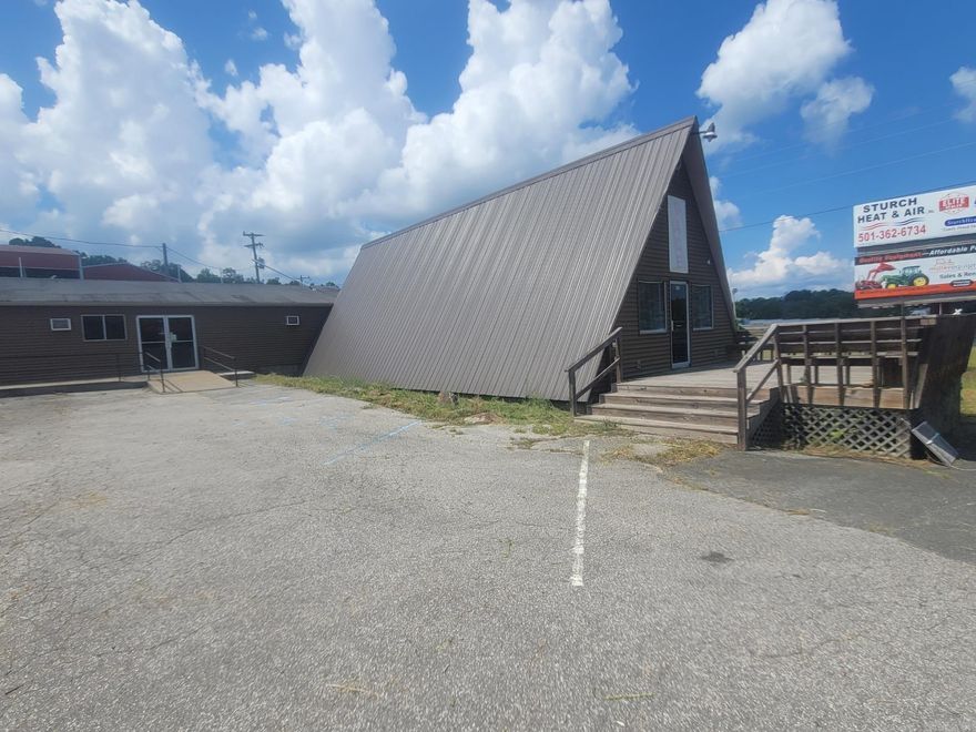 Prime Commercial Opportunity near Greers Ferry Lake! Located on the high-traffic Hwy 25B N in Heber Springs, this 3,650 sq ft A-frame commercial building offers excellent visibility and endless potential. Formerly operated as a seafood market and restaurant, the property is ideally positioned just minutes from Dam Site Recreational Park and beautiful Greers Ferry Lake—perfect for capturing lake traffic and visitors. Featuring ample parking and flexible interior space, this location is ideal for a restaurant, retail store, coffee shop, or specialty business. With its unique architecture and sought-after location, this is a fantastic investment opportunity in one of Heber Springs' most active areas.