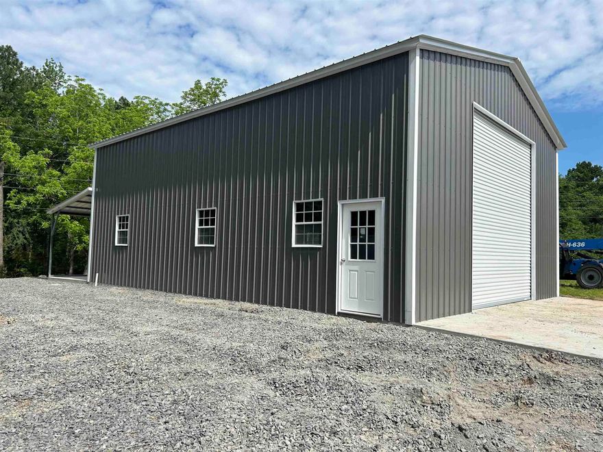Great place to call home. There is already a very nice brand new 30'x40' shop with a 30'x 12' back covered porch and a 30' x 20' concrete pad in the front. There is a sprawling 4.67 acres +/- to explore and find the perfect spot for your dream home.  This is a new construction, there is no SPD because the seller has never lived on the property.   All new pic water lines and new septic lines  that are ready for plumbing inside the building.  Freeze proof faucets outside.  As a bonus to the property, there is 1900’s hand dug well with pristine water is ready for use as an additional water supply.  It is ready for camper hook up inside the building.  Secluded area no other homes around the area There are two beautiful buildings spots on the property Sunrise in the morning sunset in the evening.   Water and septic lines inside the building that our connection ready.