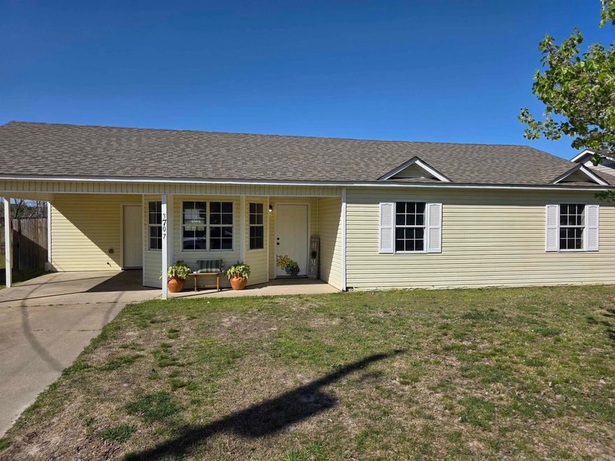 Beautiful home , Three Bedrooms and Two baths and a one car carport. LV floors , appliances stay with the house. Slab Floor, Fenced in Back yard.