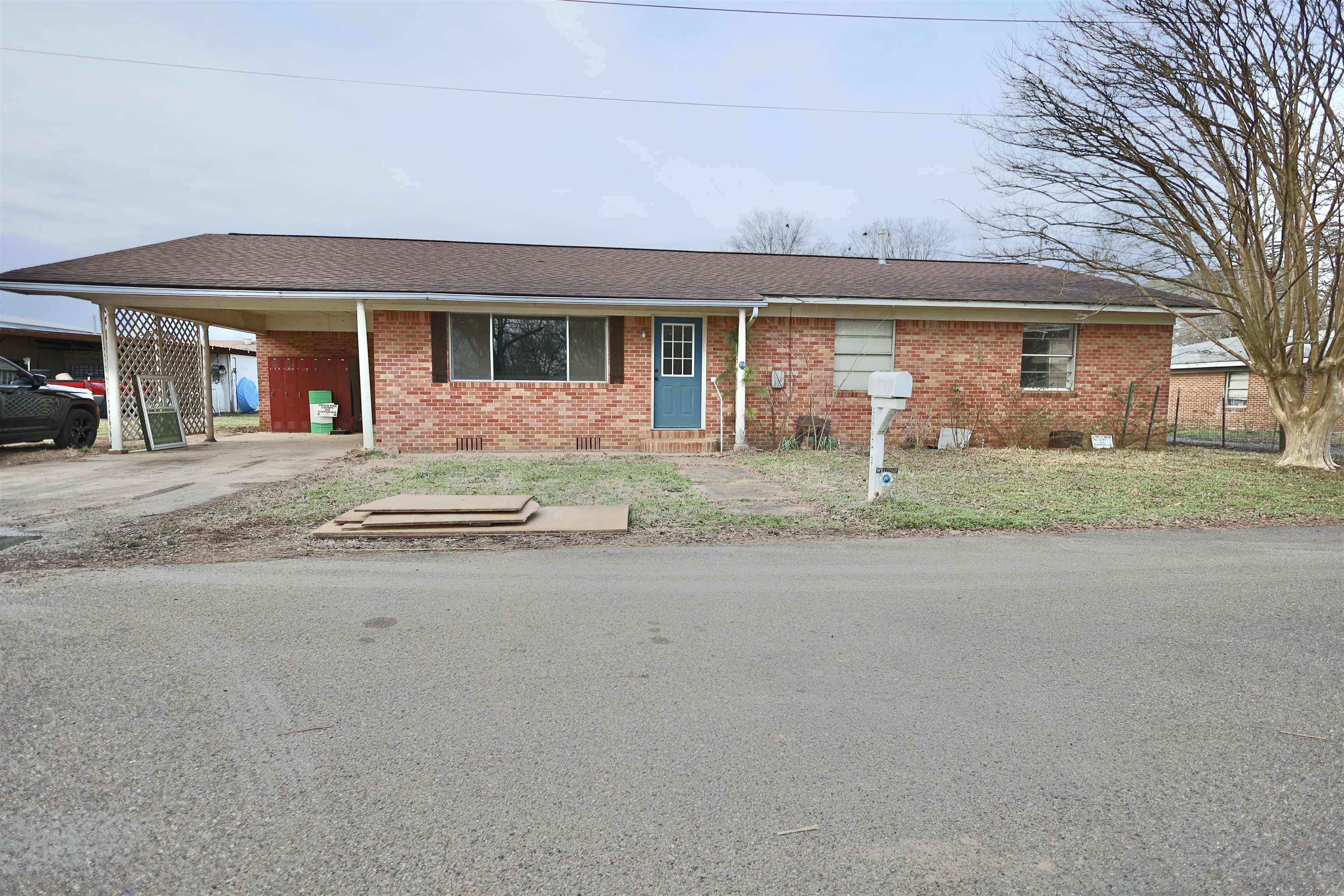 Discover the potential of this 3-bedroom, 2-bath brick home, perfectly situated within city limitsĀ and just a short drive from Crater of Diamonds State Park. Featuring a spacious eat-in kitchenĀ with a separate dining area, this home is ideal for gatherings and everyday living. A bonus roomĀ offers flexibility for a home office, playroom, or extra storage. Enjoy the additional 200+ sq. ft.Ā unfinished room at the back, ready for your creative touch! The partially fenced yard providesĀ privacy and space for outdoor activities. With a 5-year-old roof and HVAC system, plus aĀ brand-new dishwasher, several updates have already been taken care of. While the home couldĀ use a little TLC, it presents a fantastic opportunity to add your own style and value. Donāt miss outĀ on this well-located property with endless possibilities!