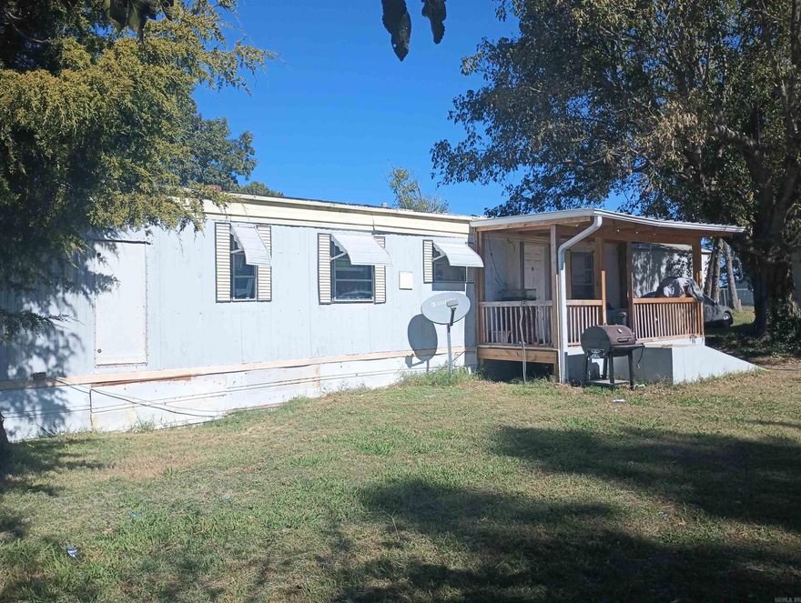 Business Opportunity! 2 older mobile homes currently rent for $450 & $500. Both have 2BR, 1BA, One MH is a 14x56, 2nd one is 12x46.  Located near city park and walking distance of Marmaduke school. See AGENT REMARKS.