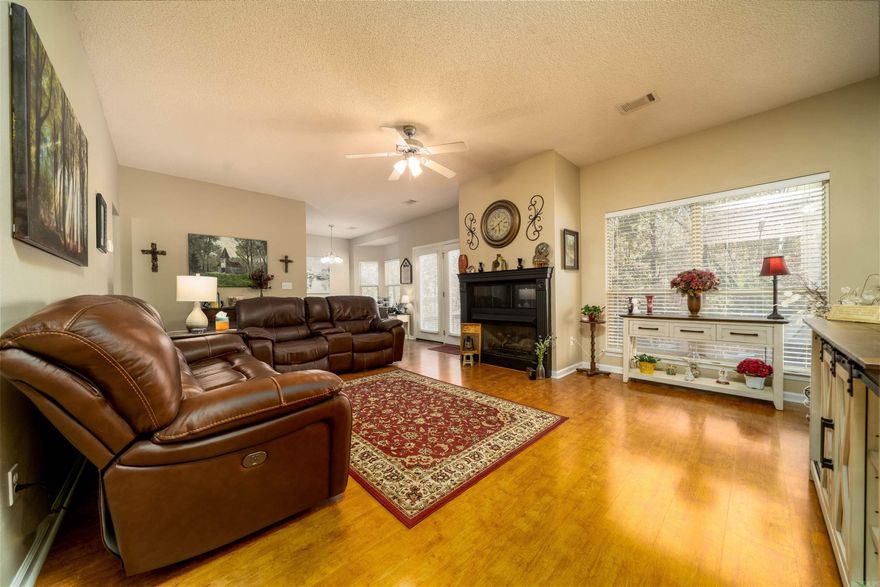 This Beautiful Hot Springs Village Home is ideal for young families or those wishing to downsize! Enjoy convenient golf cart access to the Balboa Golf Course Clubhouse. The kitchen boasts quartz countertops, upgraded appliances, and more. A split floorplan offers privacy for Mom and Dad, while the spacious deck, overlooking a wooded, fenced backyard, is perfect  for BBQ's, pets and peaceful relaxation. Additional highlights include a gas log fireplace, hardwood floors, fresh paint, new carpet in the bedrooms and more.