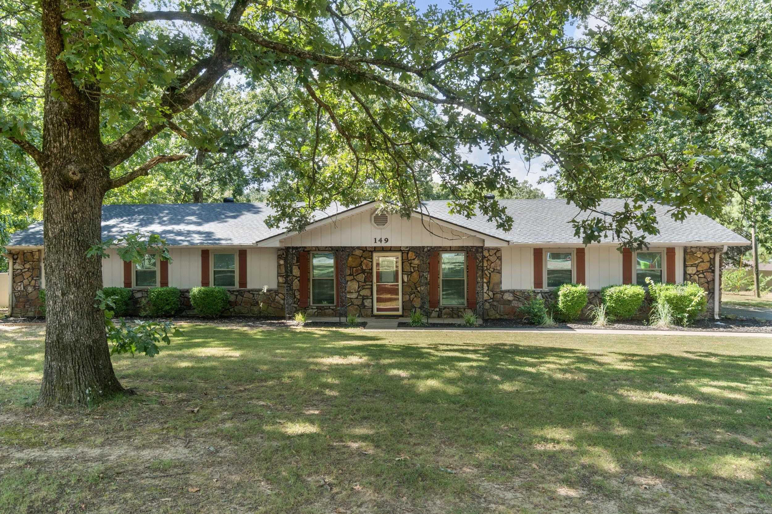 Discover the perfect blend of comfort and country living, just minutes from Conway! This beautifully updated home sits on 5 unrestricted acres and is truly move-in ready. It features a new roof with a 10-Year Transferable Warranty, a 2023 HVAC system, new furnace w/built in dehumidifier, vinyl privacy fence, water filtration system, a spacious utility/laundry room, abundant storage, and an open-concept layout thatās perfect for both everyday living and entertaining. Step outside and enjoy the freedom of space with covered RV parking, a workshop with a new A/C unit, and a greenhouse, ideal for hobbyists, homesteaders, or anyone looking for room to grow and create. With no restrictions and livestock allowed, youāll have the flexibility to truly make this property your own. The seller is also offering a 1 yr warranty at closing. This rare find offers peaceful, functional living with the convenience of being close to town. This gem won't last, so hurry and call today, to schedule your appointment!