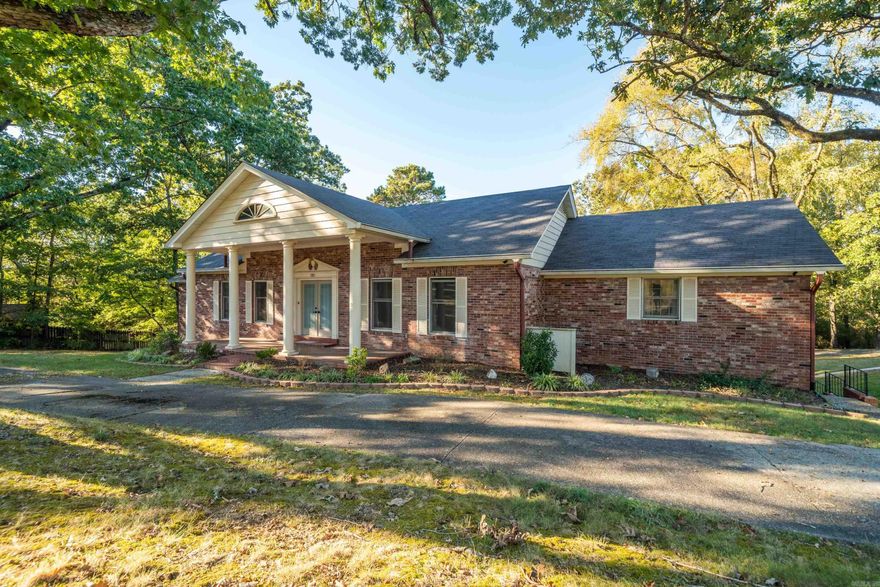 Exceptional Value — One of the Best Prices at $117 per Square Foot!  On spacious 1.17 Acres Located between the Eastgate subdivisions, this well-maintained home offers large rooms, abundant storage, and multiple living spaces ideal for entertaining. A formal living and dining area with bamboo flooring welcomes guests upon entry. The main level features a cozy den with a wood-burning fireplace and a spacious primary suite with walk-in shower, ensuite bath, and additional closet space. Upstairs includes a guest bedroom with an ensuite bath, providing privacy and convenience. The lower level expands the living space with a second den/game room featuring a fireplace, two additional bedrooms, a full bath, and a bonus room perfect for a home office or gym. Recent updates include: new refrigerator and dishwasher, engineered wood plank flooring, granite bathroom countertops, updated lighting, fixtures, and hardware, and a new water heater. Outdoor storage included.