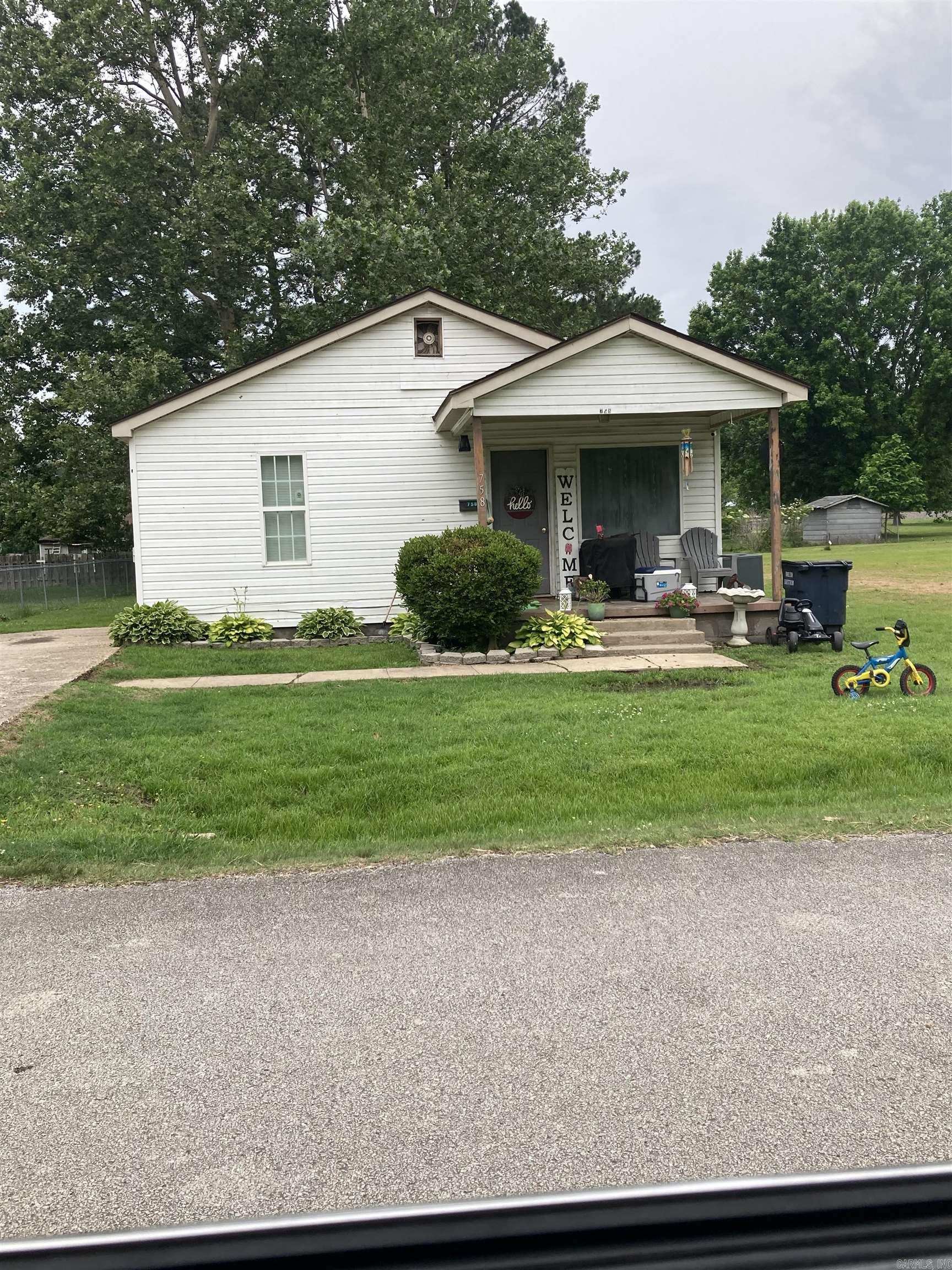 This beautiful home has 4 bedrooms, 2 bath rooms, and a nice backyard. This property is a great opportunity to own a home in a desirable location.