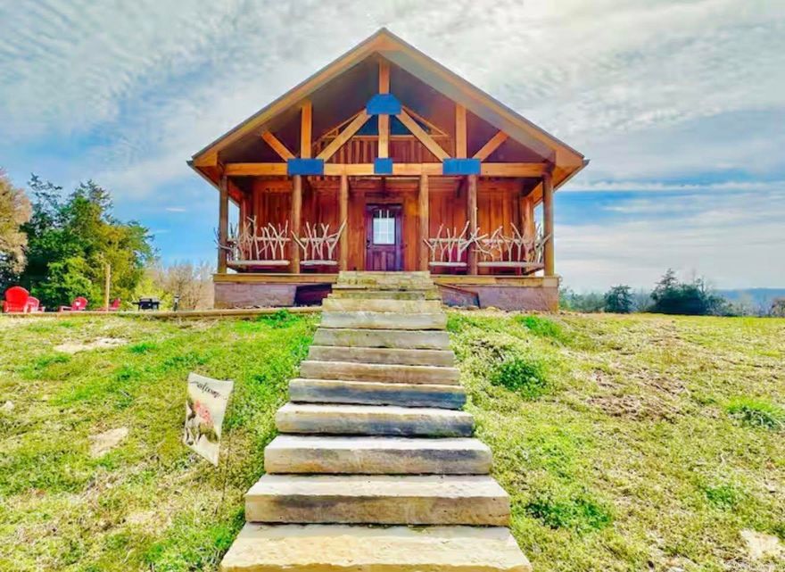 Turn-key, income-producing opportunity with beautiful mountain views! This property features two cabins currently operating as successful Airbnb rentals, situated on 5 acres with potential room to add another rental cabin.  Cabin 1: Built in 2021 – 758 sq ft Cabin 2: Built in 2024 – 576 sq ft  Each cabin has its own septic system, and both convey fully furnished, making this a true ready-to-go investment from day one. Conveniently located within 10 minutes of downtown Mountain View and just a few miles from the world-famous White River, this property offers the perfect combination of privacy, views, and accessibility. Whether you’re looking for a short-term rental investment, a live-in-one rent-the-other setup, or a personal vacation getaway, this property offers excellent potential.