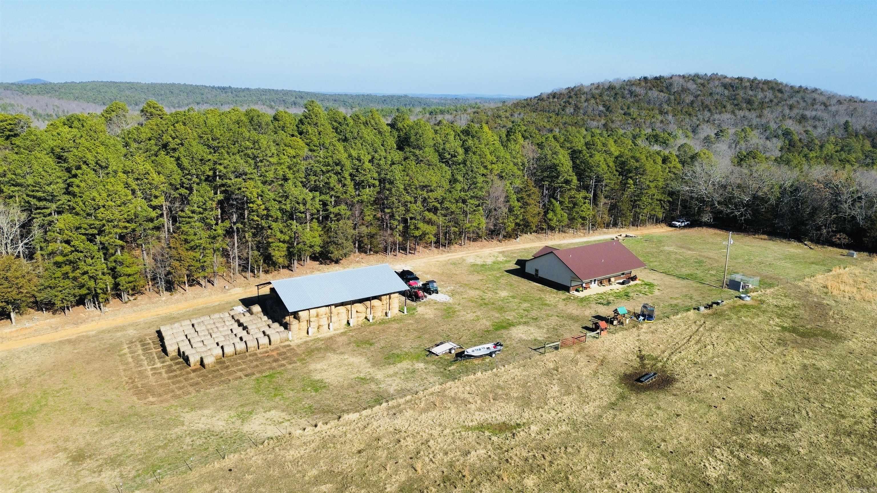 Located in the breathtaking Ozark Mountains, this remarkable 320 acre cattle ranch property is full of endless opportunities! With access to the national forest, bordering 3 sides of the property, and abundant wildlife- including deer, bear, hogs, and turkey roaming freely throughout the land- this is the perfect destination for hunting, wildlife observation, and recreational opportunities. Additionally, there is close proximity to the White River, providing access to world-class fishing and water activities. With a 3 bedroom, 2 bathroom ranch-style home as this propertyās centerpiece, it boasts spacious living areas with panoramic windows that frame stunning views of the surrounding landscape. This home blends modern conveniences with the warmth of country living. This property also functions as a fully operational cattle ranch, equipped with ample grazing land, a well-maintained infrastructure, and the opportunity to embrace the ranching lifestyle, whether you're a seasoned or aspiring rancher. It also features a year round creek, with serene waterfalls, and a 60x40 hay barn! This Ozark gem offers a lifestyle defined by nature, ranching, and adventure. Listed at $1,200,000