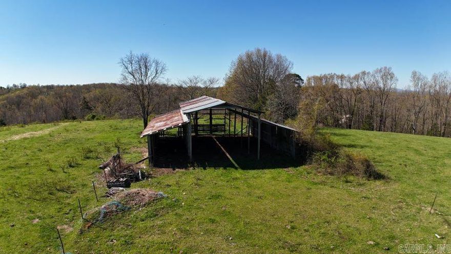 Working farm just off paved Hwy. Gated entry sets off road for easy access off the Hwy. This 139.76 acres has a hay field, pond, working coral, spring and hay barn. Pasture and woods make this perfect for hunting or building a home with a view while still having plenty of room to farm. Additional acreage available.