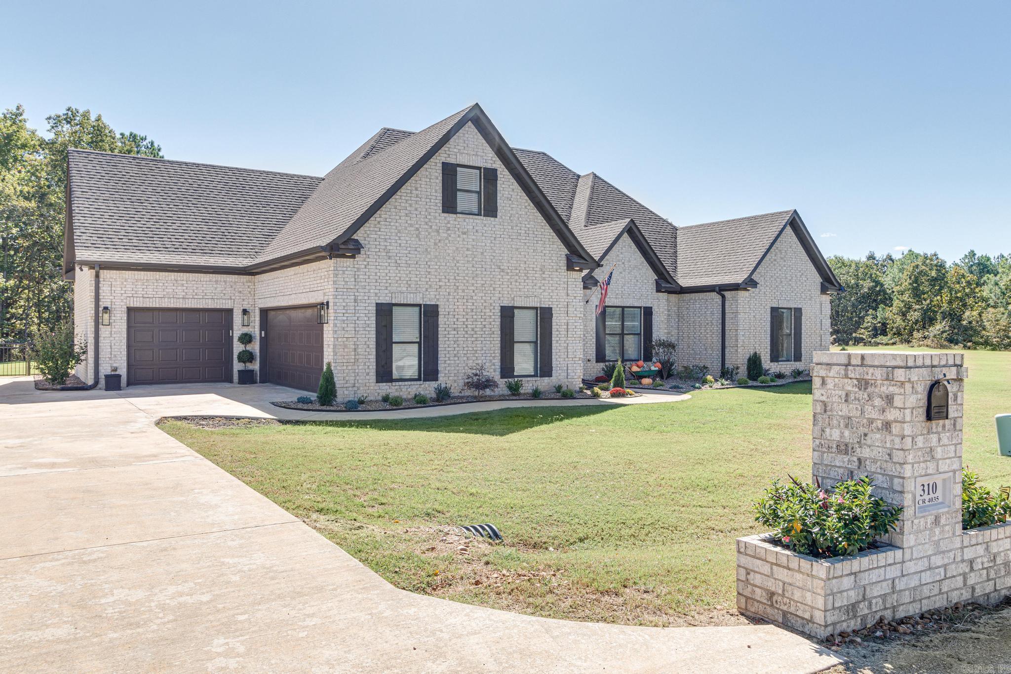 You have got to check out all the upgrades and character in this like new home, the owners have made some stunning changes and additions including a 25x40 shop with hvac and full bath, inground pool, sodded the three acres, added additional landscaping and interior built ins and kitchen upgrades, you will love the cozy fireplace in the screened porch, added patio area for outdoor gatherings, and the waterfall and sundeck in the pool with the iron fenced back yard so you can watch the deer roam at the wooded area of your three acres! 24kw full house generator w/buried propane, salt water pool by RMS pools, all blinds in living & primary are remote, this home has it all!