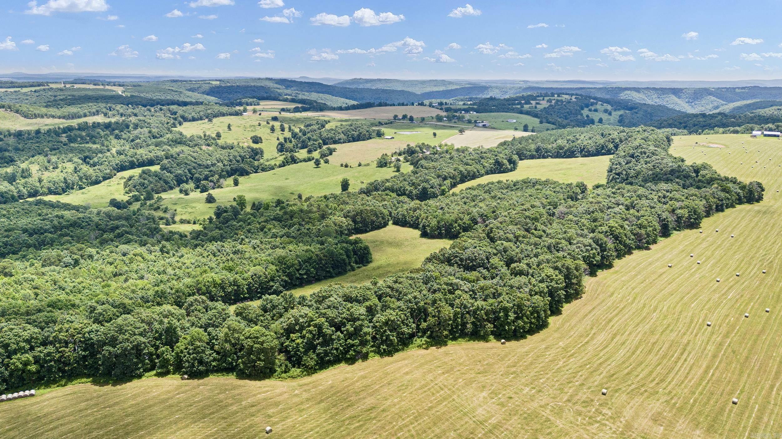 102 acre Prime recreational tract offering a stunning blend of natural features! Enjoy breathtaking mountain views, a spring-fed pond, and a wet weather creek flowing through the northeast corner of the property. This versatile piece features a perfect mix of mature timber, new growth timber, and open hay meadows, ideal for hunting, outdoor adventures, or building your dream getaway. Abundant wildlife roam the area, making it a true sportsmanās paradise. With utilities available at the highway, this tract combines convenience with seclusion and beauty. Donāt miss your chance to own a slice of the Arkansas outdoors!