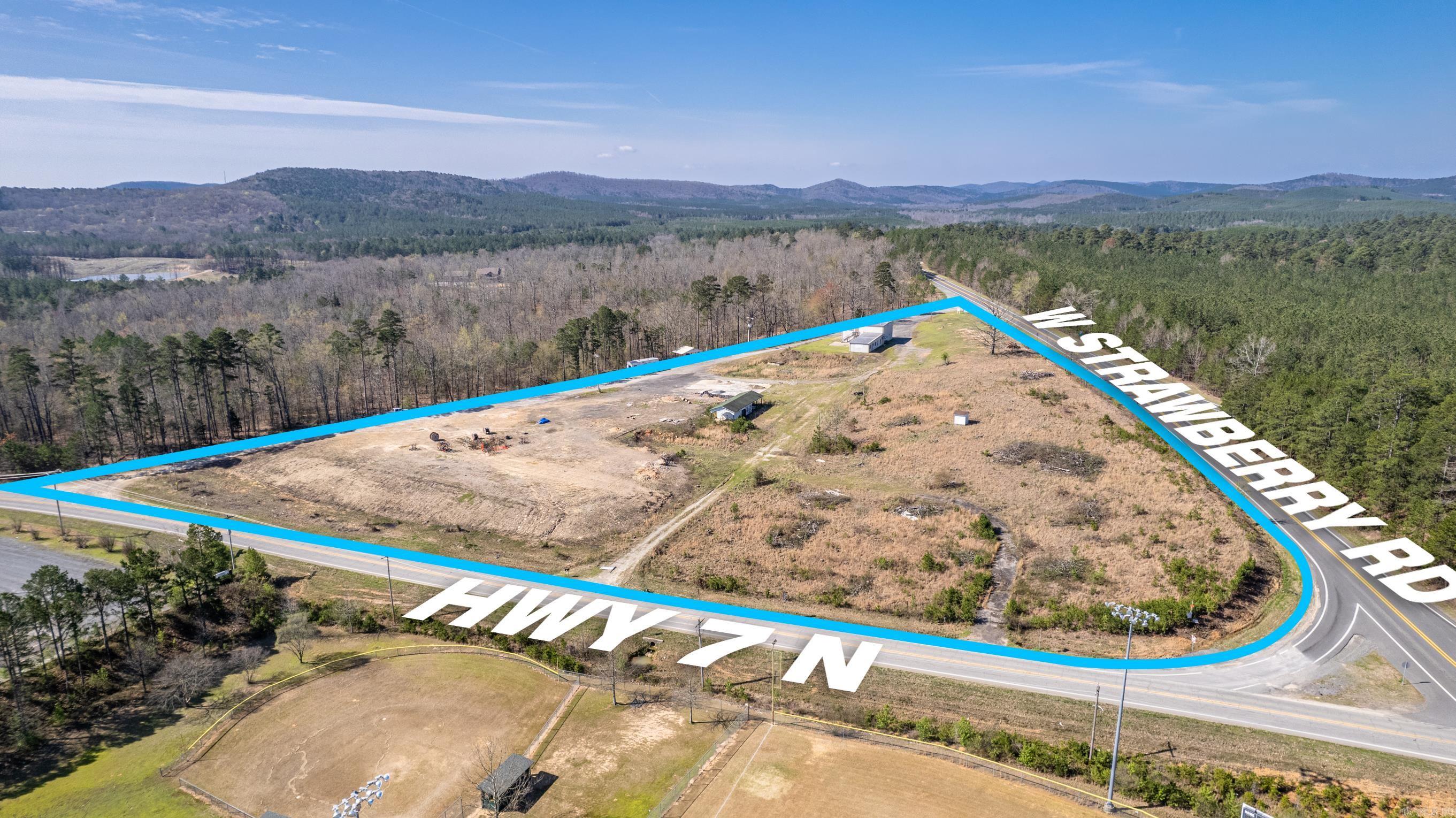 Investor opportunity for development! VERY high traffic area! Perfectly positioned at the intersection of Scenic Highway 7 North and W. Strawberry (Highway 192) gives way for endless use possibilities! Call with all questions for details! Just a few miles from Three Sisters Campground and Marina at the Beautiful Lake Ouachita! (Church building and 3 acres have been removed from the listing--may still be shown in photos)